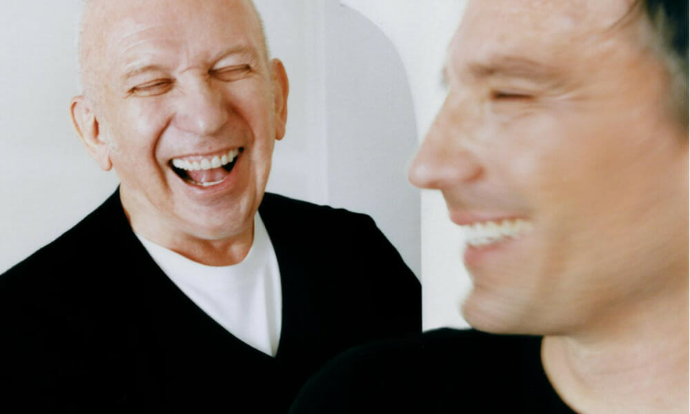 Julien dossena shakes hands with jean paul gaultier to make haute couture